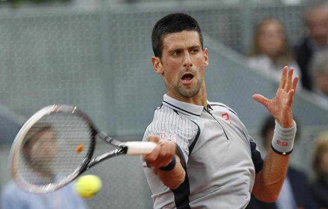 Brutta giornata per Novak Djokovic, eliminato all'esordio a Madrid dal promettente bulgaro Grigor Dimitrov. Epa